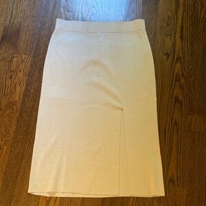 Banana Republic sweater skirt. Cream with metallic threads. Size L. Front slit.